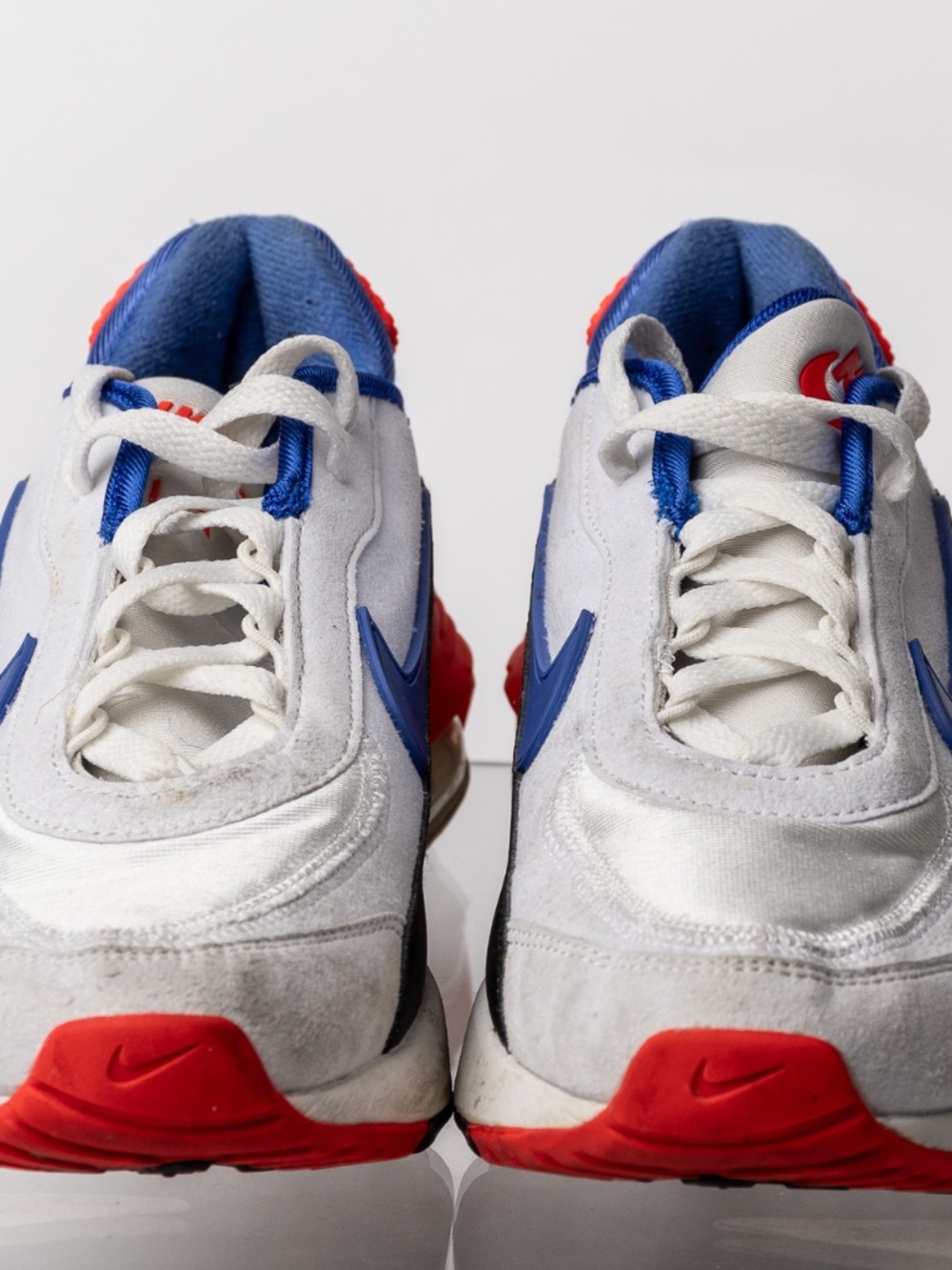 Nike red, white with blue swoosh size 7